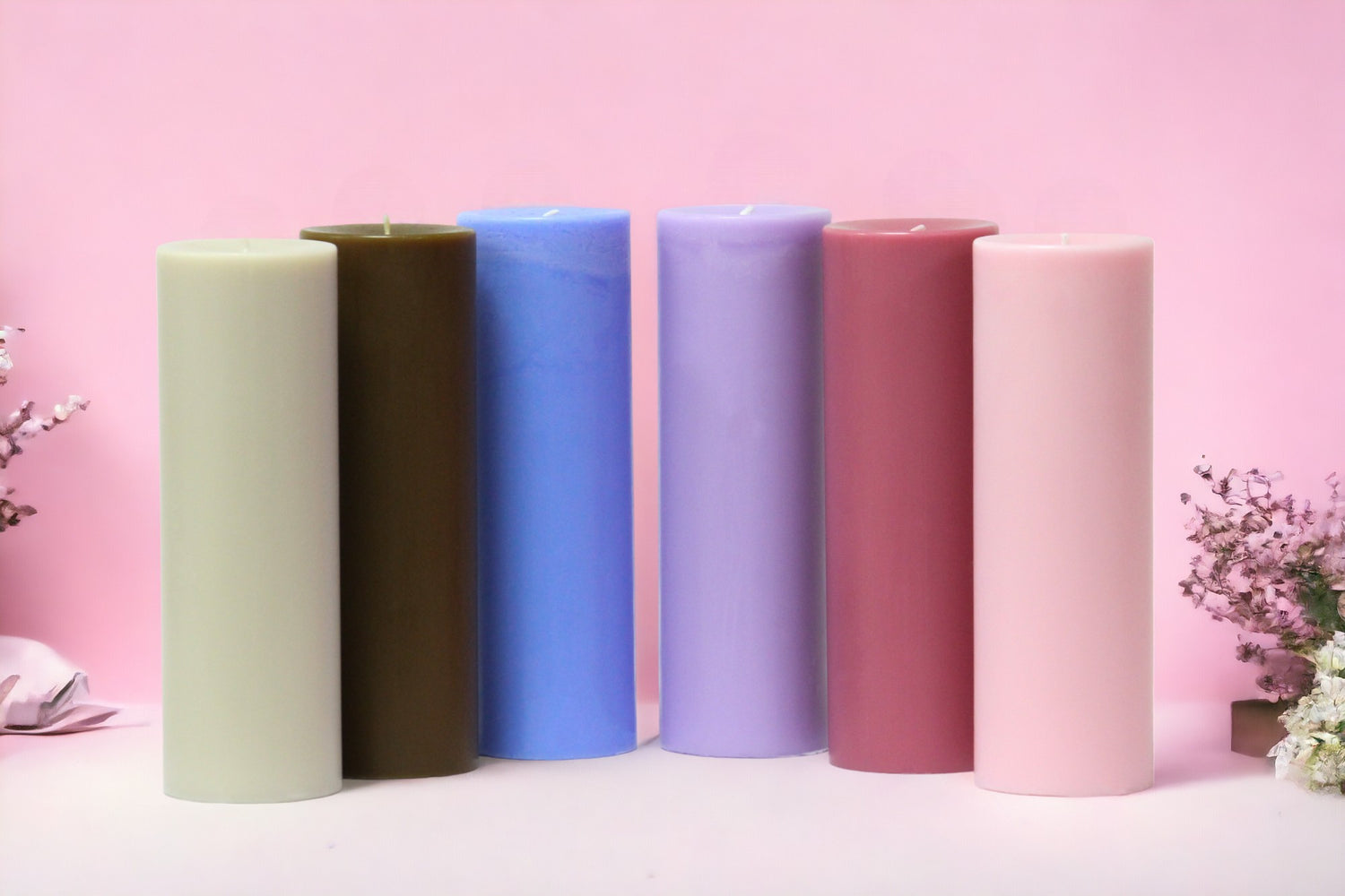Five coloured pillar candles